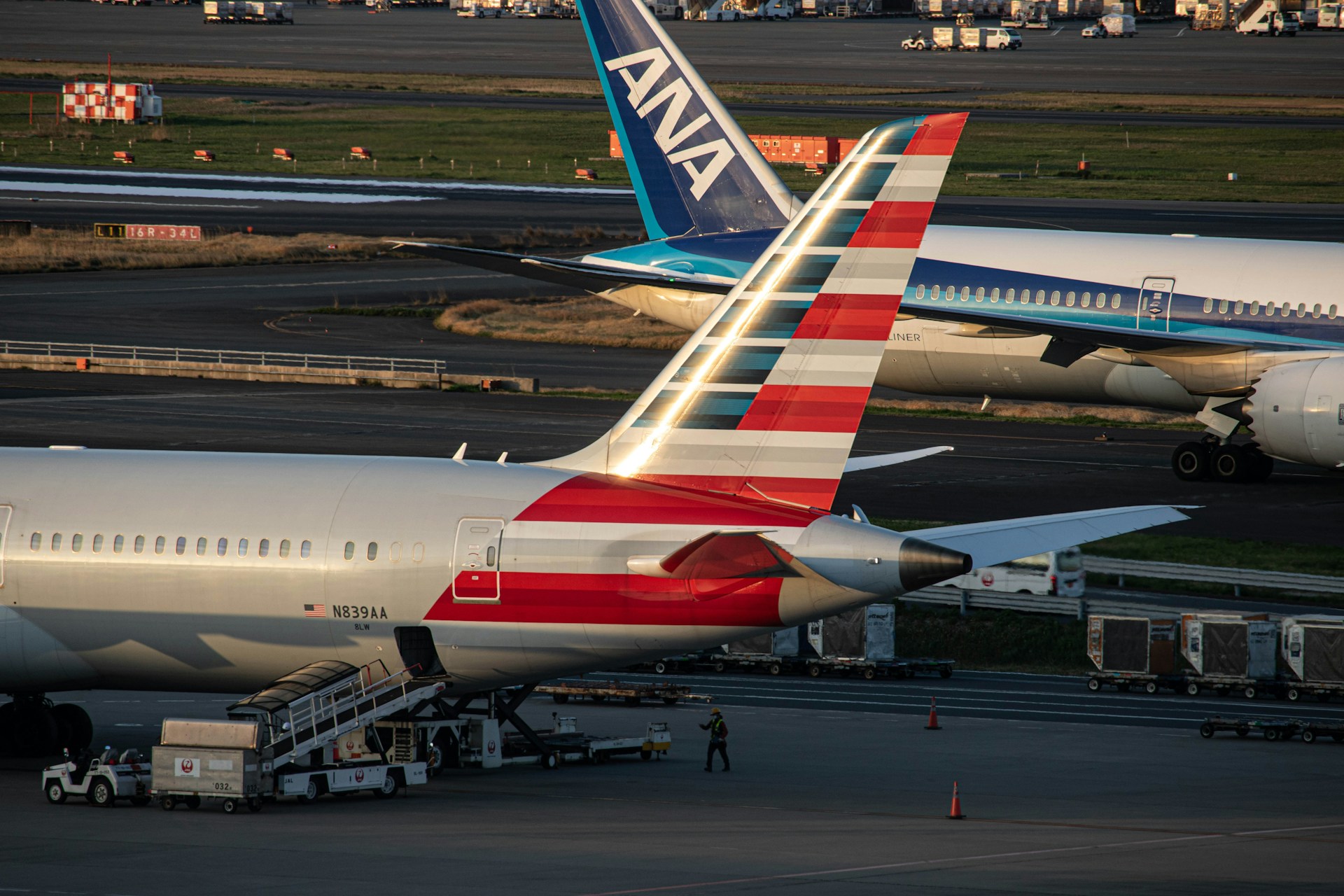 Two airplanes parked close together